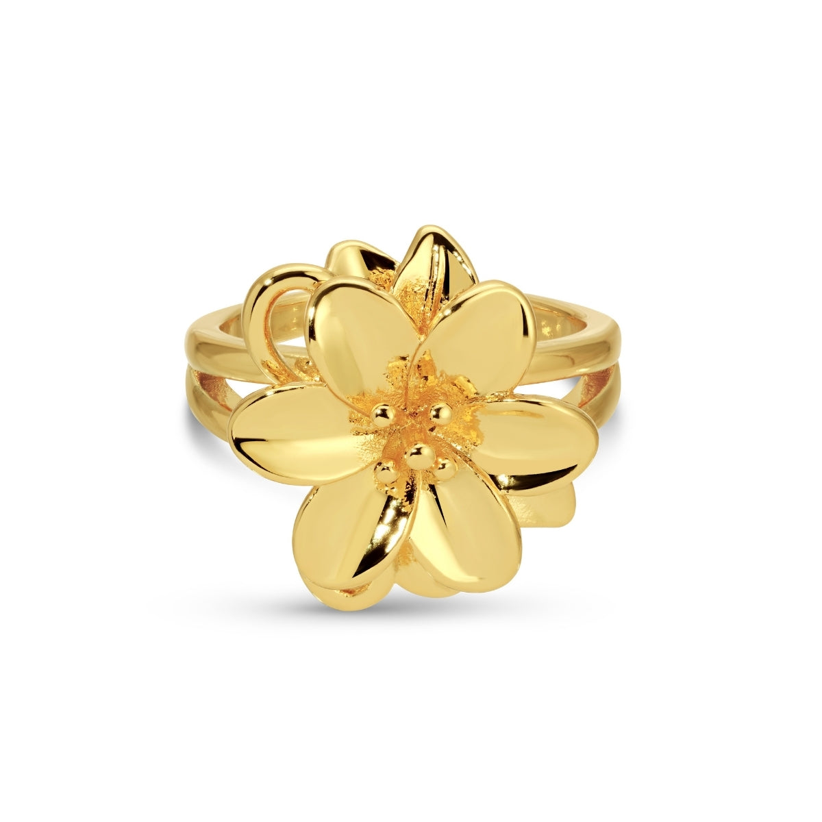 Gold flower-shaped ring on a white background